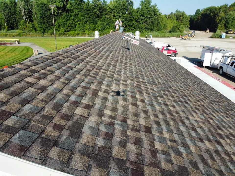 Pristine Roofing LLC installing a new roof in Marysville, MI.